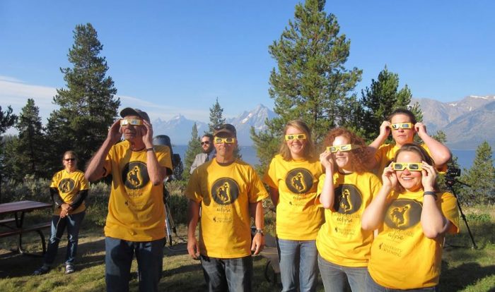 Image of researchers wearing glasses for viewing an eclipse