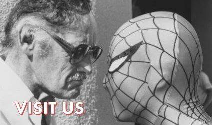 Stan Lee and Spiderman giving each other a hard stare with the words "Visit Us" at the bottom.
