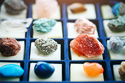 Colorful display of rocks on white background