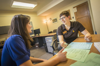 Student working with an advisor