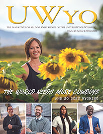 magazine cover for issue 21-2, woman in field of sunflowers