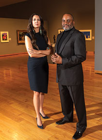 man and woman in an art gallery