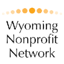 Wyoming Nonprofit Network Logo - the words Wyoming Nonprofit Network with fold circles above