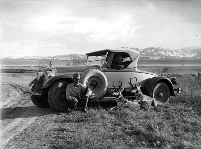 Hunters and their bucks, ca. 1930s.