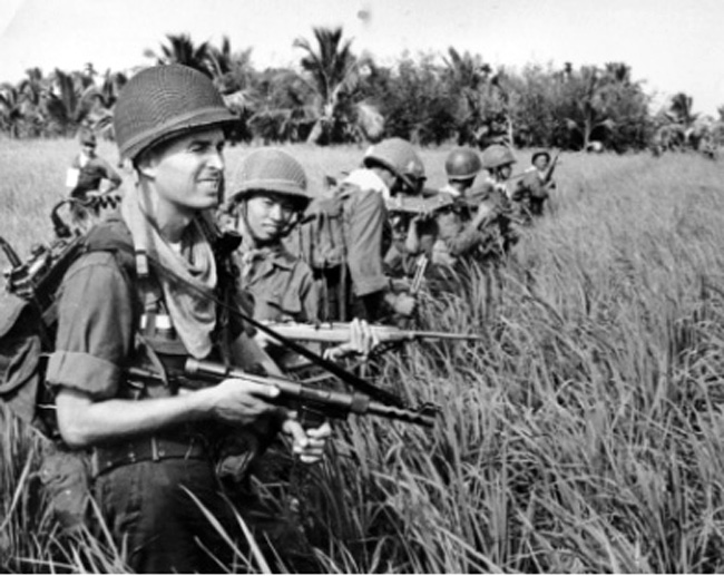 Soldiers on ground patrol, 1962-1963.