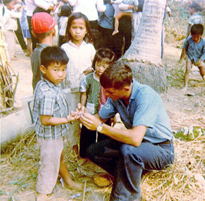 Soldier with band-aids, 1968-1969.