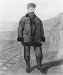 Drawing of Casement next to railroad tracks holding a whip