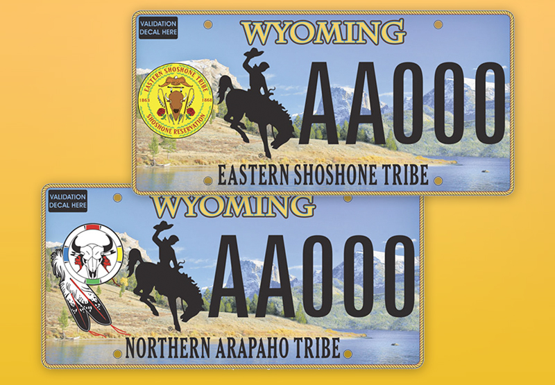 Two tribal license plates in blue on top of a gold background: Eastern Shoshone Tribe and Northern Arapaho Tribe