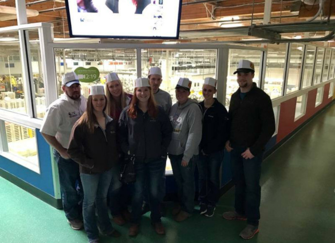 Students from the University of Wyoming Food Science Club tour a food processing facility. 