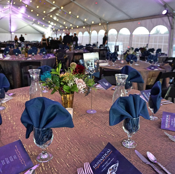 Gala tables in tent