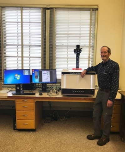 dave mullen with monitors and light boxes