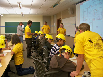 working with elementary students with hard hats