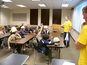 students teaching boy scouts