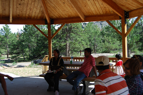 Students talking at picnic table