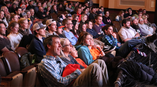 Photo of people watching a movie