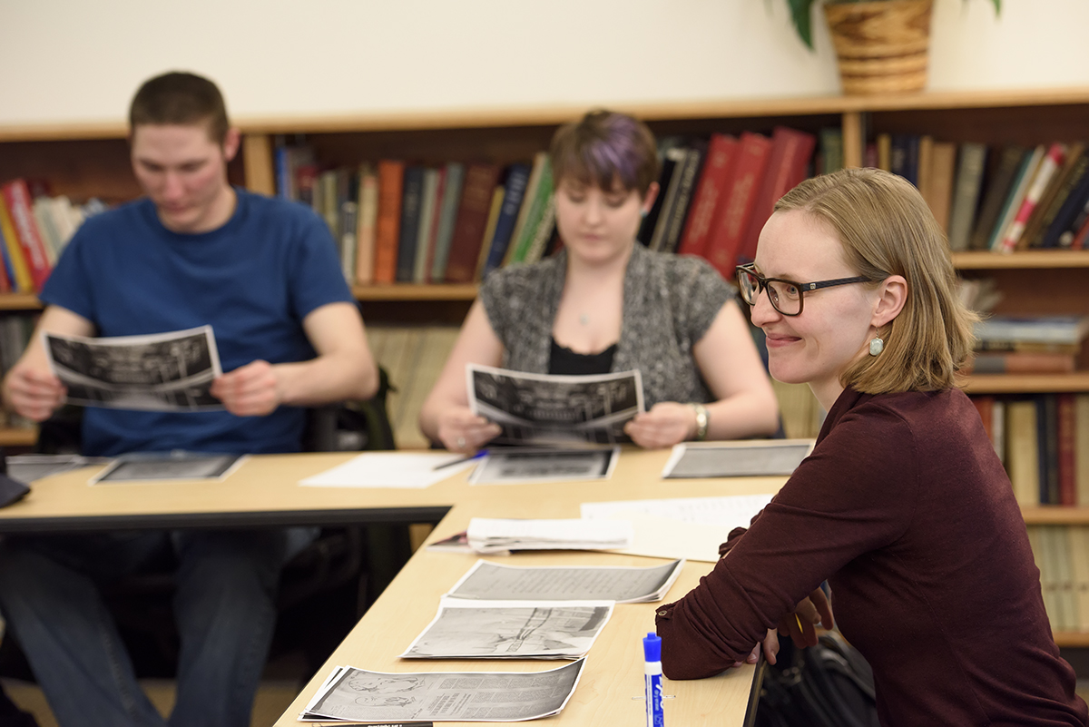 students examine historical media