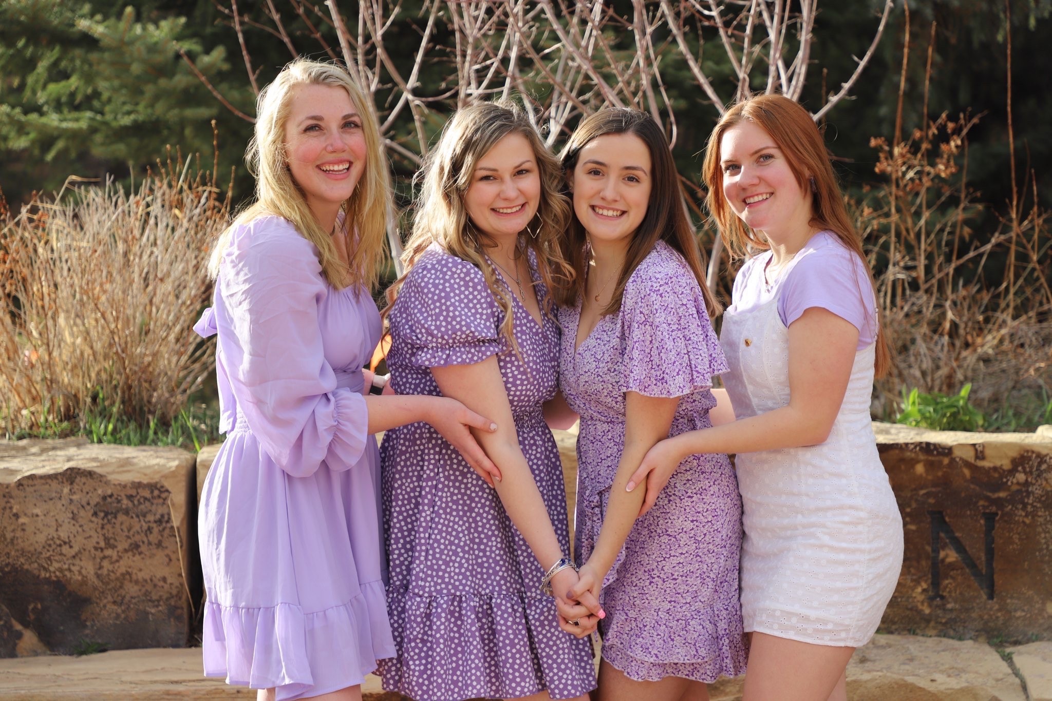 Kappa Kappa Gamma members in purple