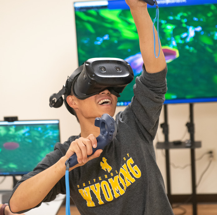 Kinesiology student practicing VR technology
