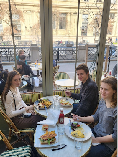 Emily at lunch with her family in Paris