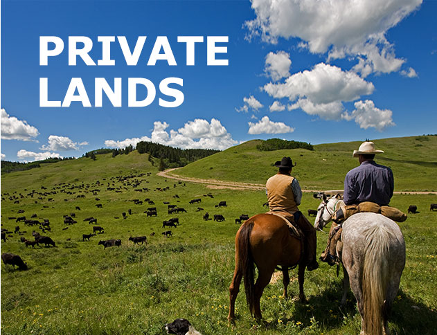 Private Lands with ranchers on horses in the background