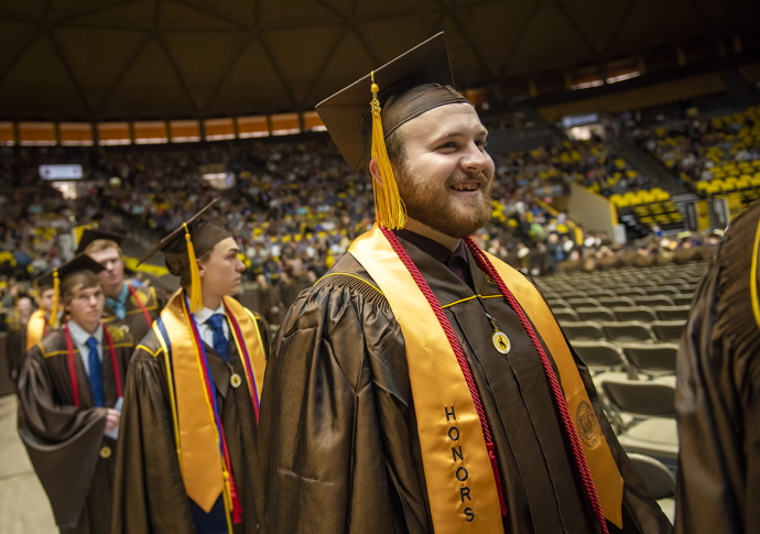 Students walking in a graduation ceremony