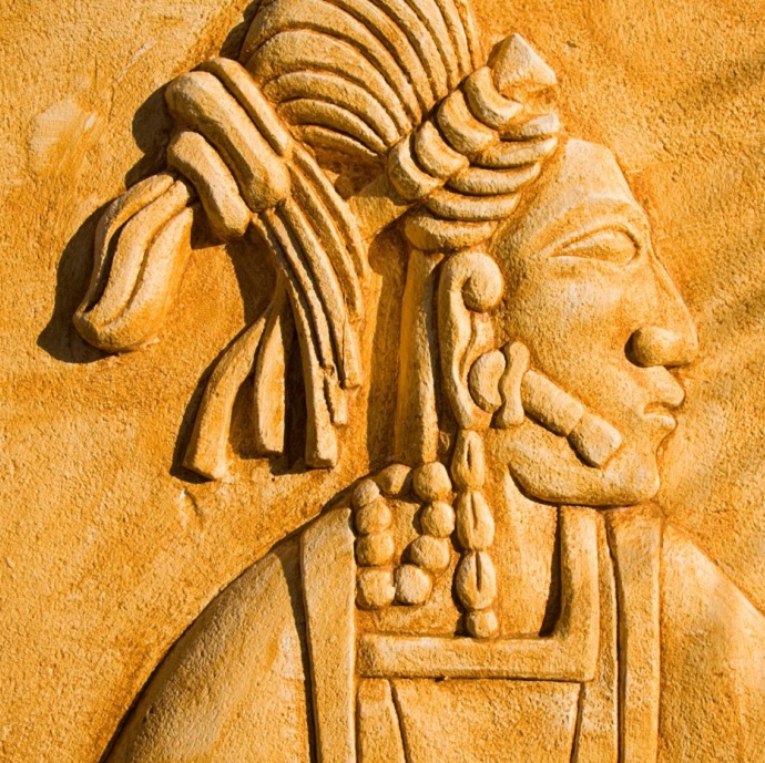 A Mayan carving of a person