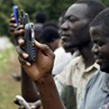 Ghana men with cellphones