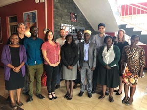 addie myers and prof. novogrodsky in Uganda with partners
