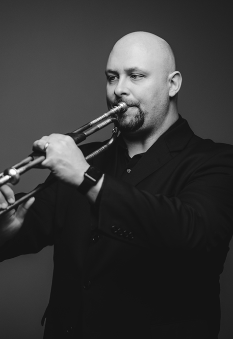 Man playing a trumpet.