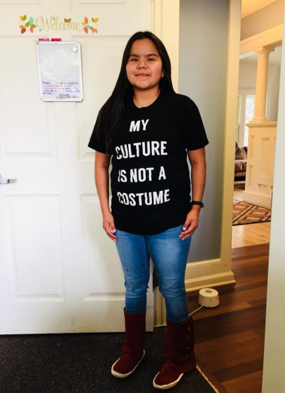 student with a native shirt