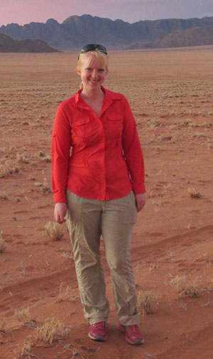 woman standing outside in desert area