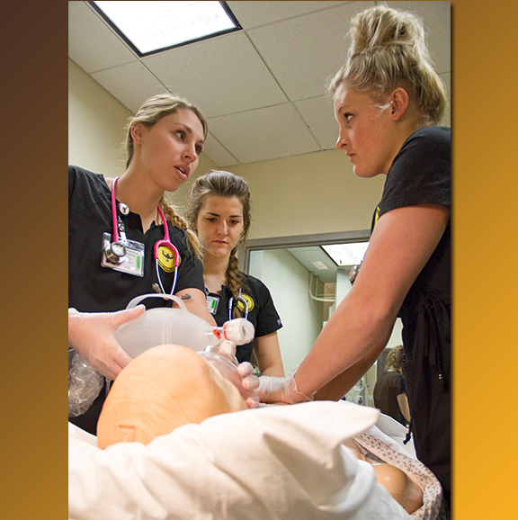 Nursing students work as a team during a simulation exercise in preparation for clinical placements