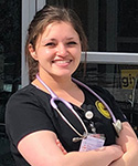 picture of Bethany Hernandez standing outside her clinical site