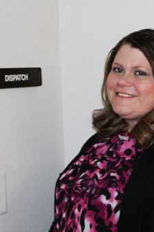 Darcey Cowardin outside the Police Dispatcher's office at UW.