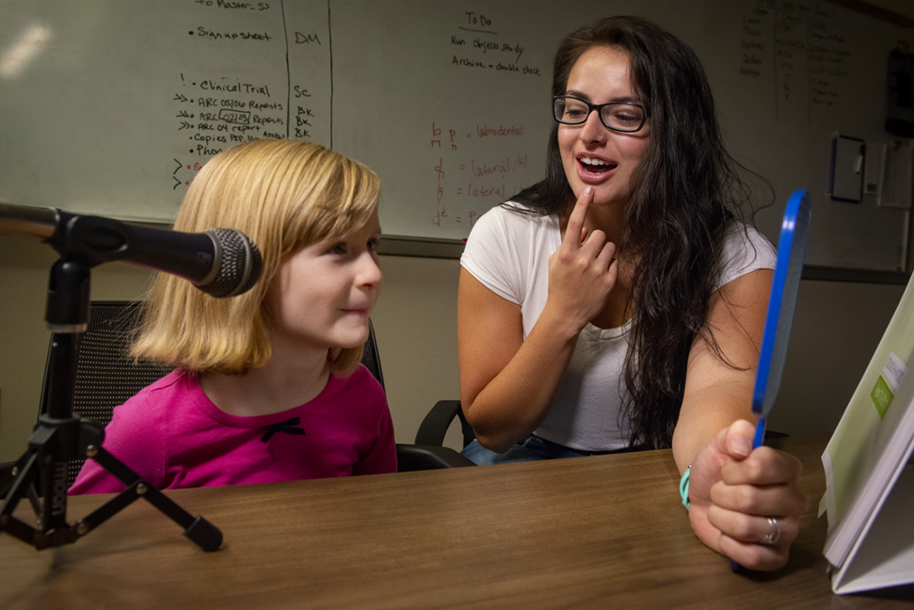 child receiving speech therapy