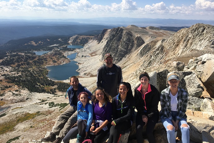 Professor Matt Gray and his lab team on the summit of Medicine Bow Peak