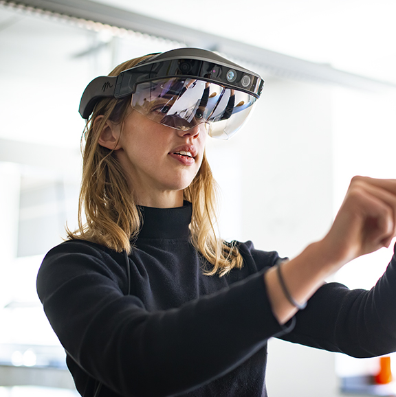 Female student using a virtual reality headset