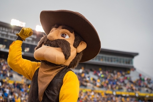 Pistol Pete getting fans excited at a University of Wyoming football game.