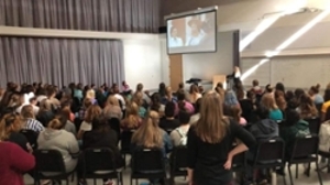 room of students watching Mary Poppins at the Sister Suffragette presentation