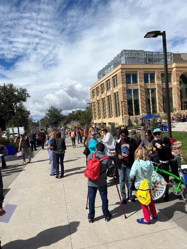 stem carnival with groups of people attending activities outside