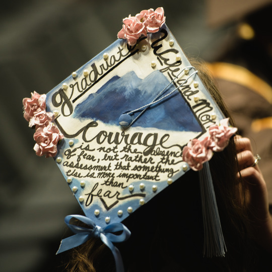 A student's decorated graduation cap at a recent UW commencement ceremony. 