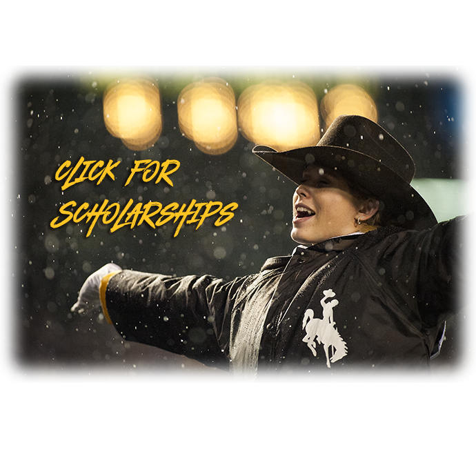 a woman with arms open to welcome the snow at a football game and holding the word scholarships in her hand