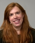 photograph of Dr. Stephanie Anderson in front of a grey background