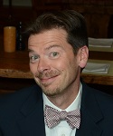 photograph of Dr. Jason McConnell in a bowtie