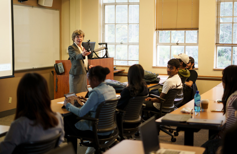 UW students sit at their desks while an instructor leads a class