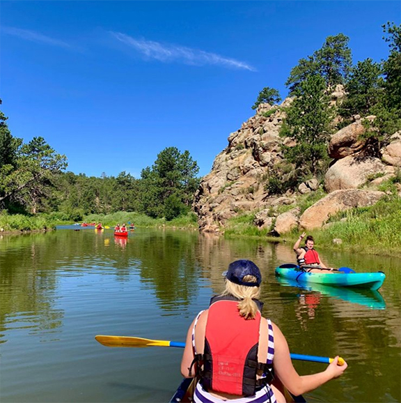 students canoe at Curt Gowdy State Park on a Saturday during 2019 Summer Bridge
