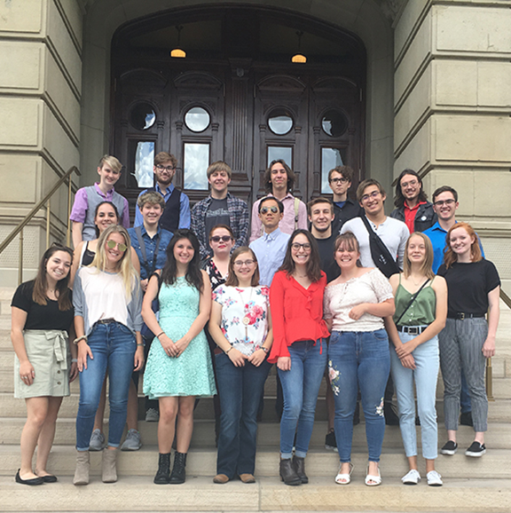 Honors Bridge students pose outside of the State Capitol in 2019