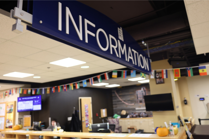 image of the information desk and sign 