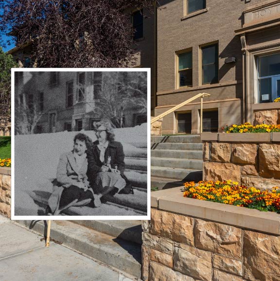 Two women sitting in front of Hoyt Hall when it was still a dorm in 1948 in front of the current day building