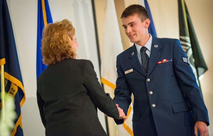 An ROTC student is sworn in to duty.